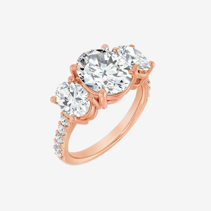 Rose gold ring with two large oval-shaped lab-grown diamonds.
