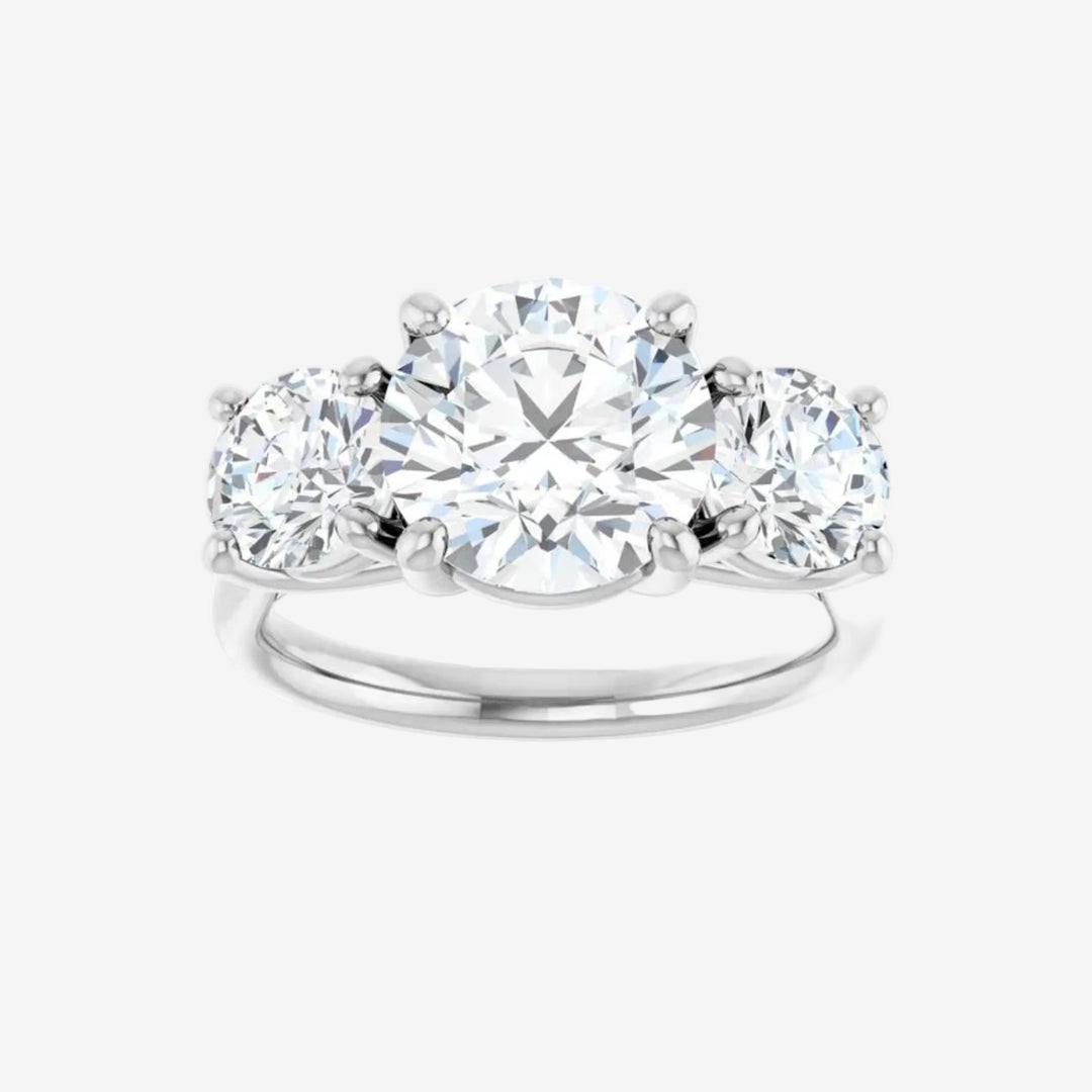 Diamond white ring with three round lab grown diamond on a white background