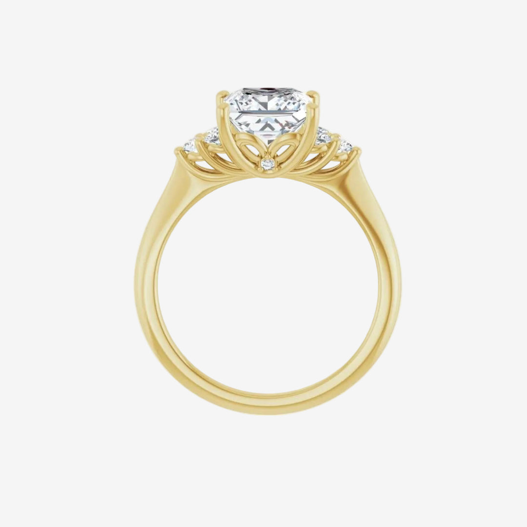 Gold ring with a square diamond and diamond branches.