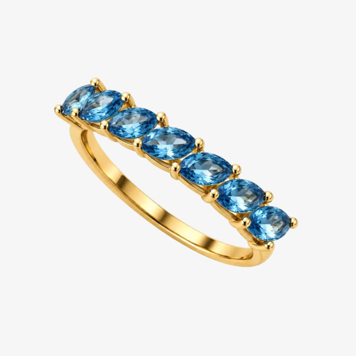 Anel de ouro 18k com topázio - Pedras: 7 topázios azuis - Metal: Ouro amarelo 18k